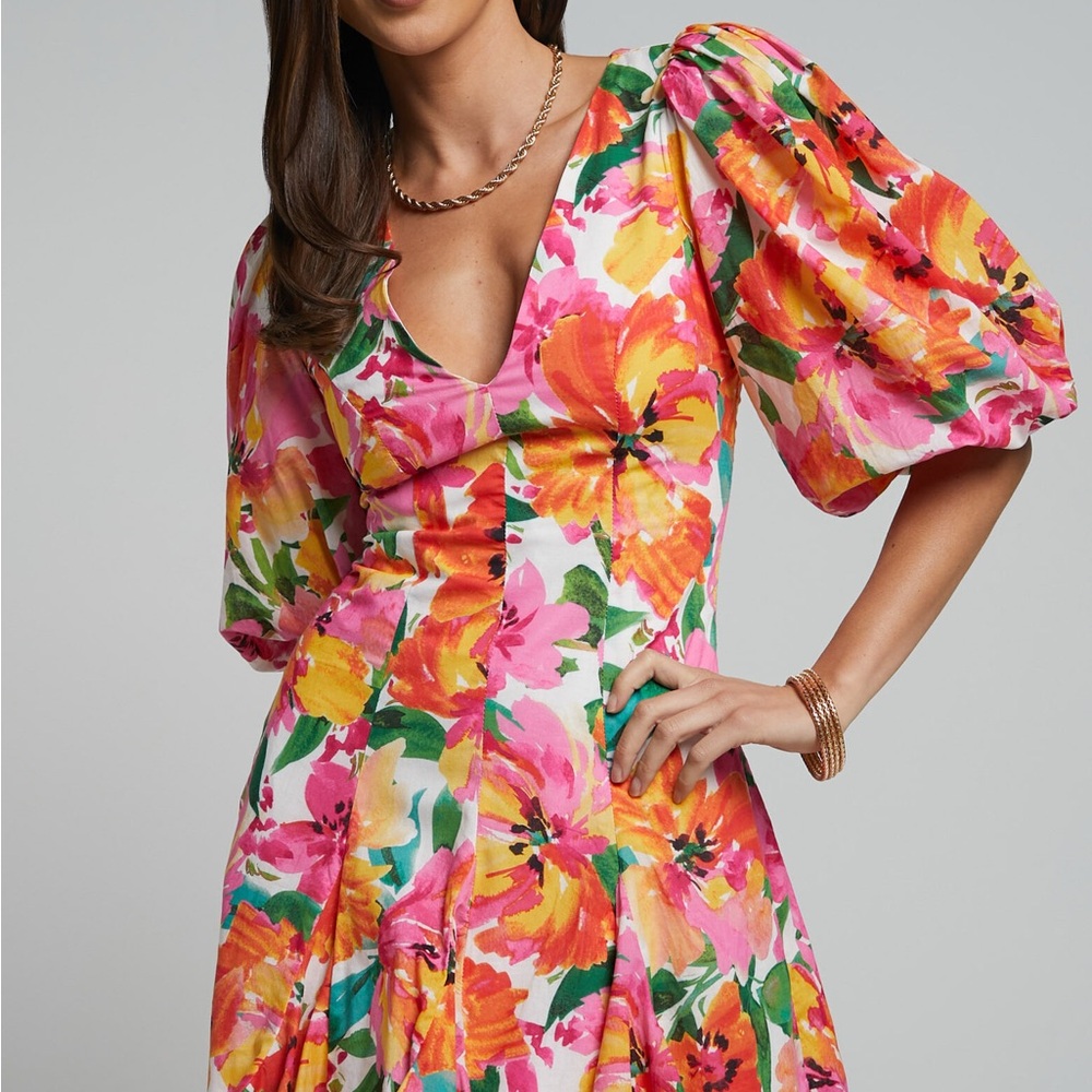 SHOWPO SHAIRAH MINI DRESS - V NECK PUFF SLEEVE FLUTTER HEM DRESS